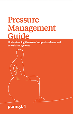 Pressure Management Guide cover is orange and white with the illustrated outline of a manual wheelchair user.